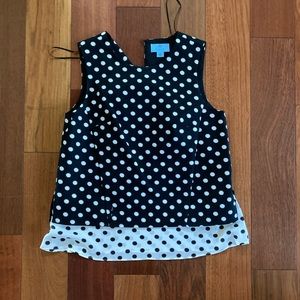 flower polka dot top. neck button closure